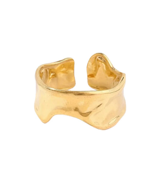 The Aurora Ring by ÈRE showcased in a close-up, featuring a unique asymmetrical design and a lustrous hammered finish, perfect for an elegant look. Ideal asymmetrical gold ring.