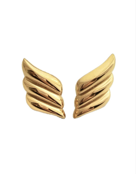 Elegant Paloma Earrings by ÈRE featuring a bold, vintage-inspired design with a shiny gold finish, designed as stunning gold statement earrings.